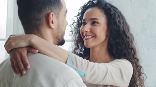 Back View Spaniard Man Husband Boyfriend Hugs Curly Brunette Woman Spanish Wife Happy Ethnic Couple