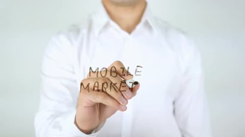 Man Writes Mobile Marketing on Glass