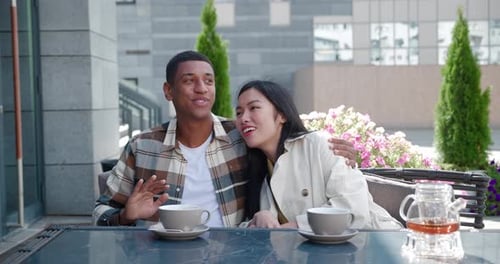 Attractive Happy Loving Couple Talking Enjoying Togetherness Chilling Sitting Close to Each Other at