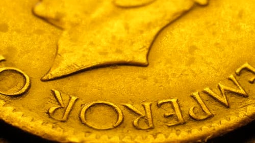 Gold Coin Macro Shot Showing Emperor Inscription