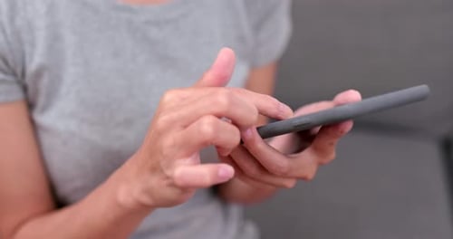Close up of woman using mobile phone