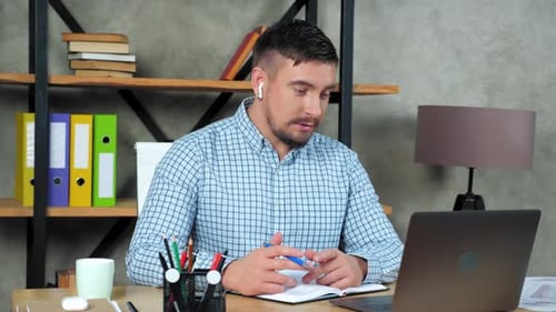 Businessman work online tells employees video call webcam laptop at home office