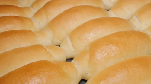 Home baked fresh crescent rolls close-up panning 4K 2160p UHD video - Tasty dough crescent rolls
