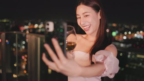 Young asian woman with sparklers is dancing and celebrating a new year.