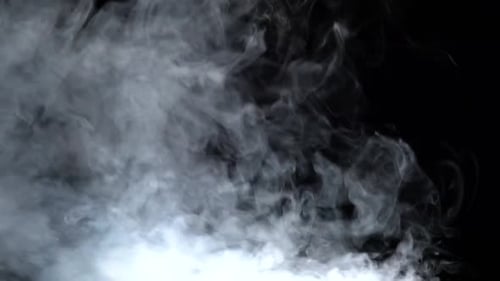 Atmospheric Wispy Smoke Rising on Black Background