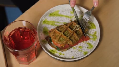 Waffle Sandwich Being Cut with Knife and Fork