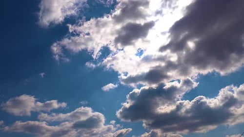 Clouds Dancing in Bright Blue Sky