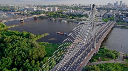 Aerial View of the Warsaw Cable Bridge in the Sunset with City on the Background