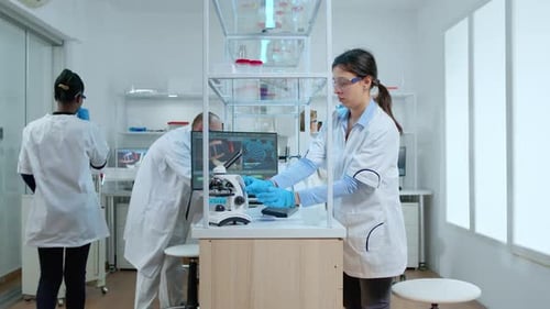 Scientists Working in a Modern Research Laboratory