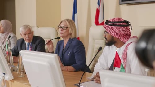 Panel of People Speaking at Conference Table
