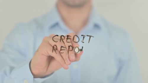 Man Writes 'Credit Report' on Glass Surface
