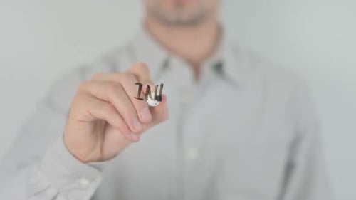 Man Writes Internet Dating on Clear Surface