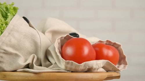 Fresh Vegetables in Reusable Bags on Turntable