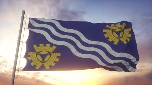 Waving Regional Flag with Emblem Against Sunset Sky