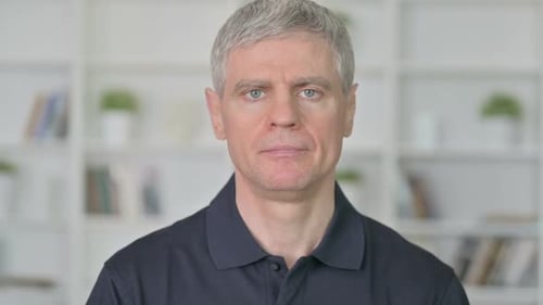 Man Looking Intently into Camera Close Up