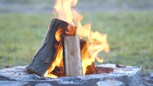 Wood Burning Brightly in Stone Fire Pit