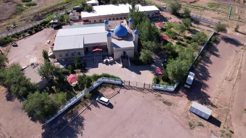 A Small Mosque Stands on the Outskirts of the City
