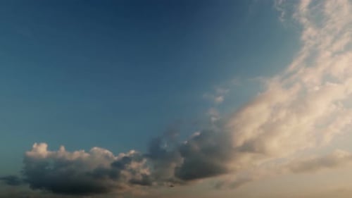 Airplane Takeoff Against Cloudy Blue Sky