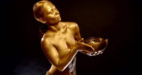Gold Woman with Artistic Bowl Poses