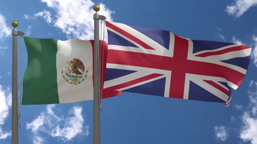 Mexican and British Flags Waving in the Wind