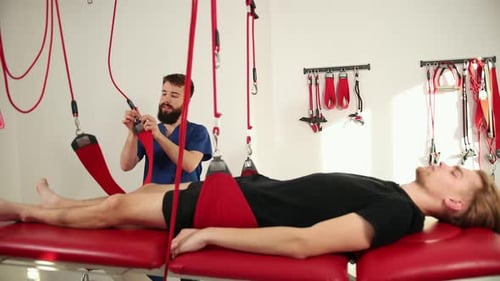 Man Receiving Medical Assistance in Clinic