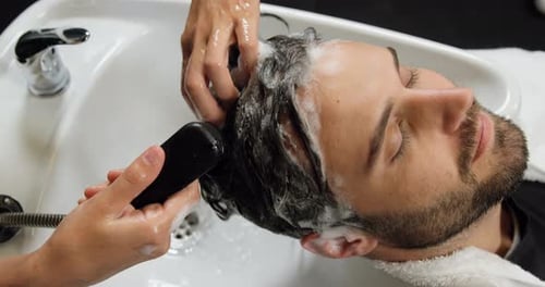 Man getting his hair wash