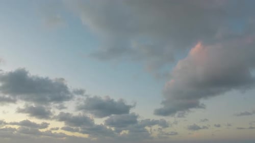 White Clouds Move in the Clear Blue Sky Over Sea Time Lapse White Cloud Swim and Change Shape