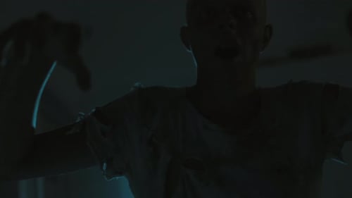 Scary Zombie In Torn Old Clothes Walks Creepy House