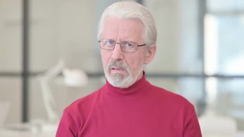 Senior Man Shakes Head No