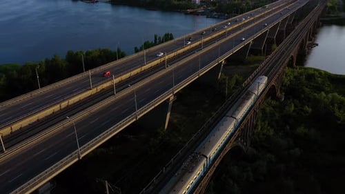 Top View of Moving Train on the Rivers Bridge
