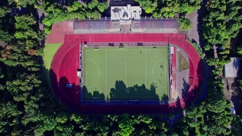 Aerial Drone of a Small Stadium Camera Down