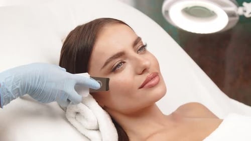 Woman Receiving a Facial Skin Treatment, Close Up