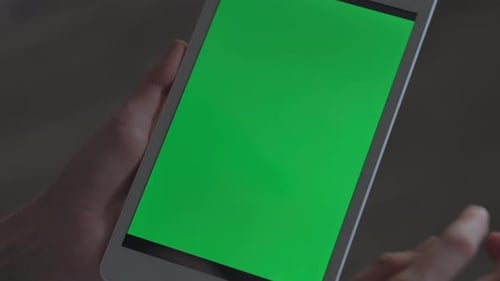 Hands Using Tablet with Green Screen, Close Up