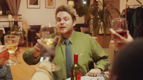 Friends Celebrate at Dinner Party with Wine