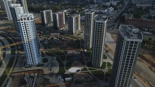 Construction of a modern city block. Multi-storey buildings