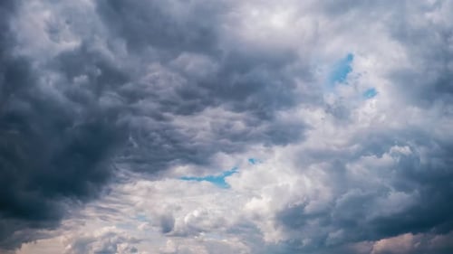 Timelapse of Gray Cumulus Clouds Moves in Blue Dramatic Sky Cirrus Cloud Space