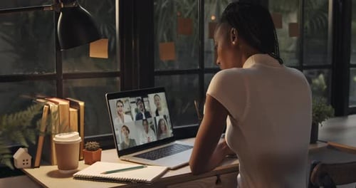 Woman in Video Conference Call at Desk