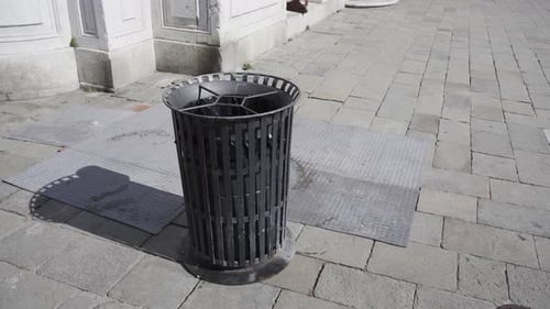 Garbage Bin in the Middle of the Road