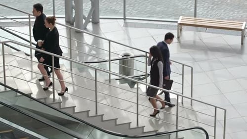 Business People Walking on Stairs