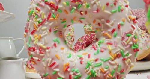 Doughnuts With Icing and Colorful Sprinkles