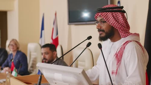 Man Speaks at International Business Conference