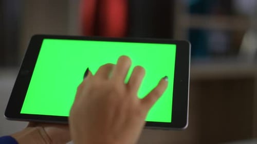 Businesswoman Hands Surfing Internet Data Using Tablet Chroma Key in Home Office