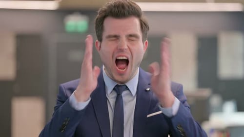 Man in Suit Yells in Frustration