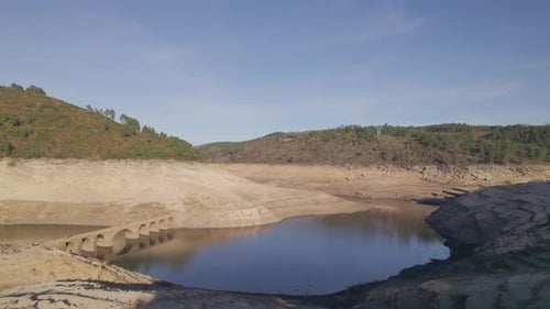 Lake Water Reservoir Aerial View Showing Low Water Levels During Drought