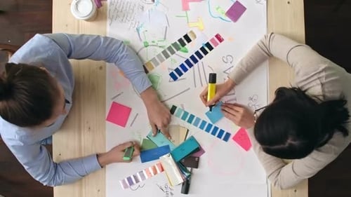 Creative Women Collaborating on Design Concepts