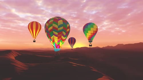 Colorful hot air balloons flying above desert mountain landscape during sunset.