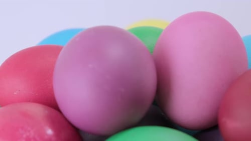 Close Up Easter Colorful Chicken Eggs Rotating on Light Background