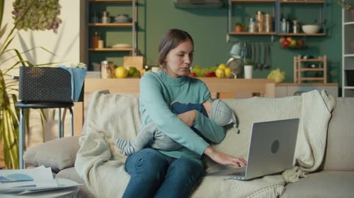 Woman on Maternity Leave is Working From Home