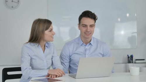 Coworkers On a Video Conference in Modern Office