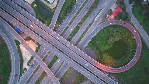4K : Hyperlapse drone shot over highway multi-level junction road.